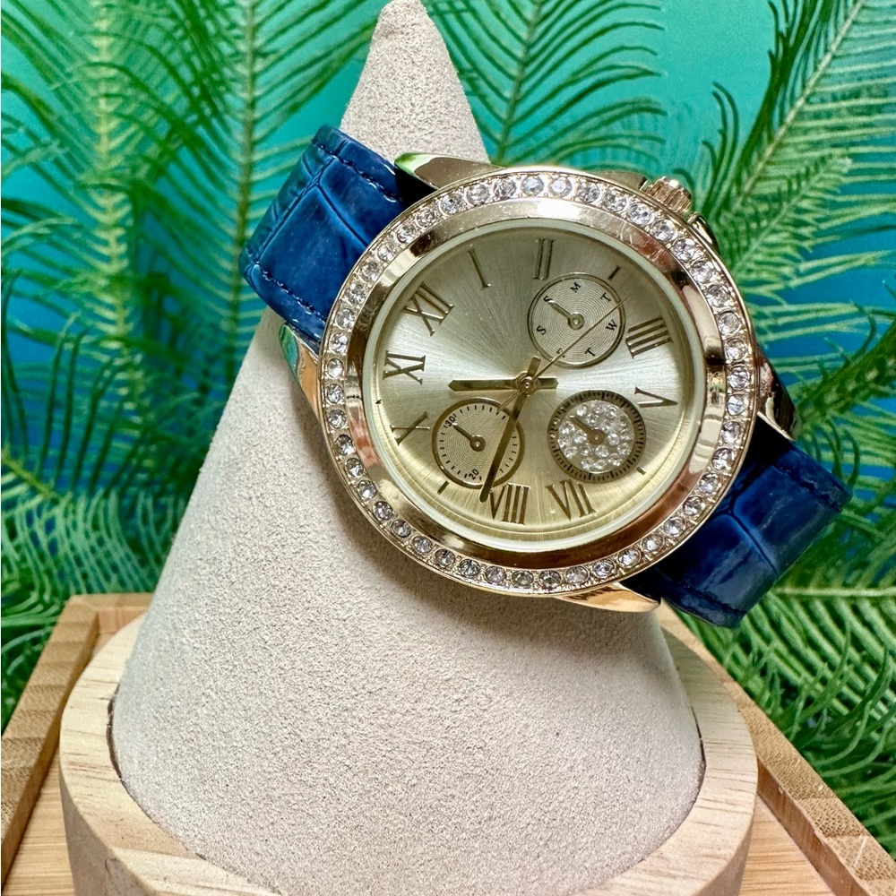 New gold tone watch